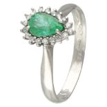 18K. White gold entourage ring set with approx. 0.56 ct. natural emerald and approx. 0.09 ct. diamon