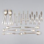 26-piece lot of various silver cutlery pieces.
