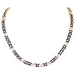 18K. Yellow gold flower-shaped entourage necklace set with approx. 3.12 ct. diamond and approx. 4.80