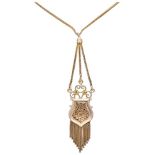 Antique 18K. yellow gold necklace and pendant with graceful engraved details.