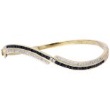 18K. Yellow gold bangle bracelet set with approx. 0.24 ct. diamond and approx. 2.28 ct. natural sapp