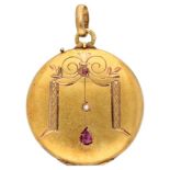 18K. Yellow gold antique medallion pendant set with ruby and seed pearl.