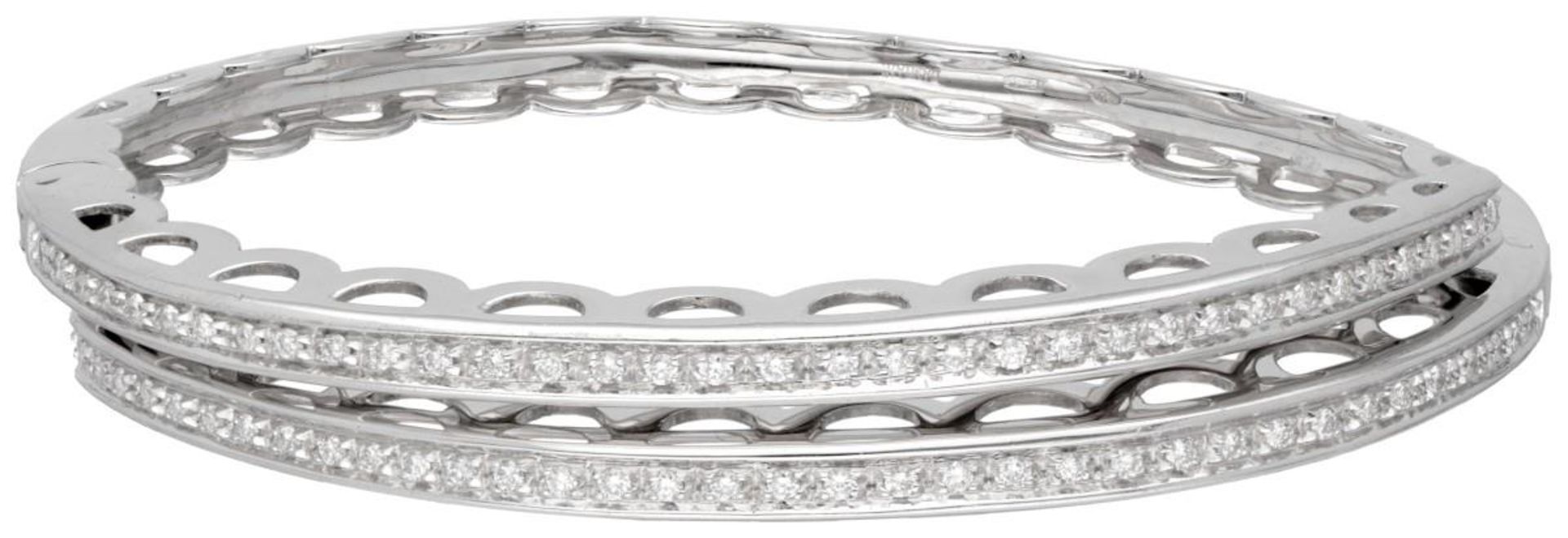 18K. White gold Damiani bangle bracelet set with approx. 0.70 ct. diamond.