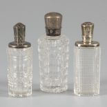 3-piece lot of perfume bottles silver.