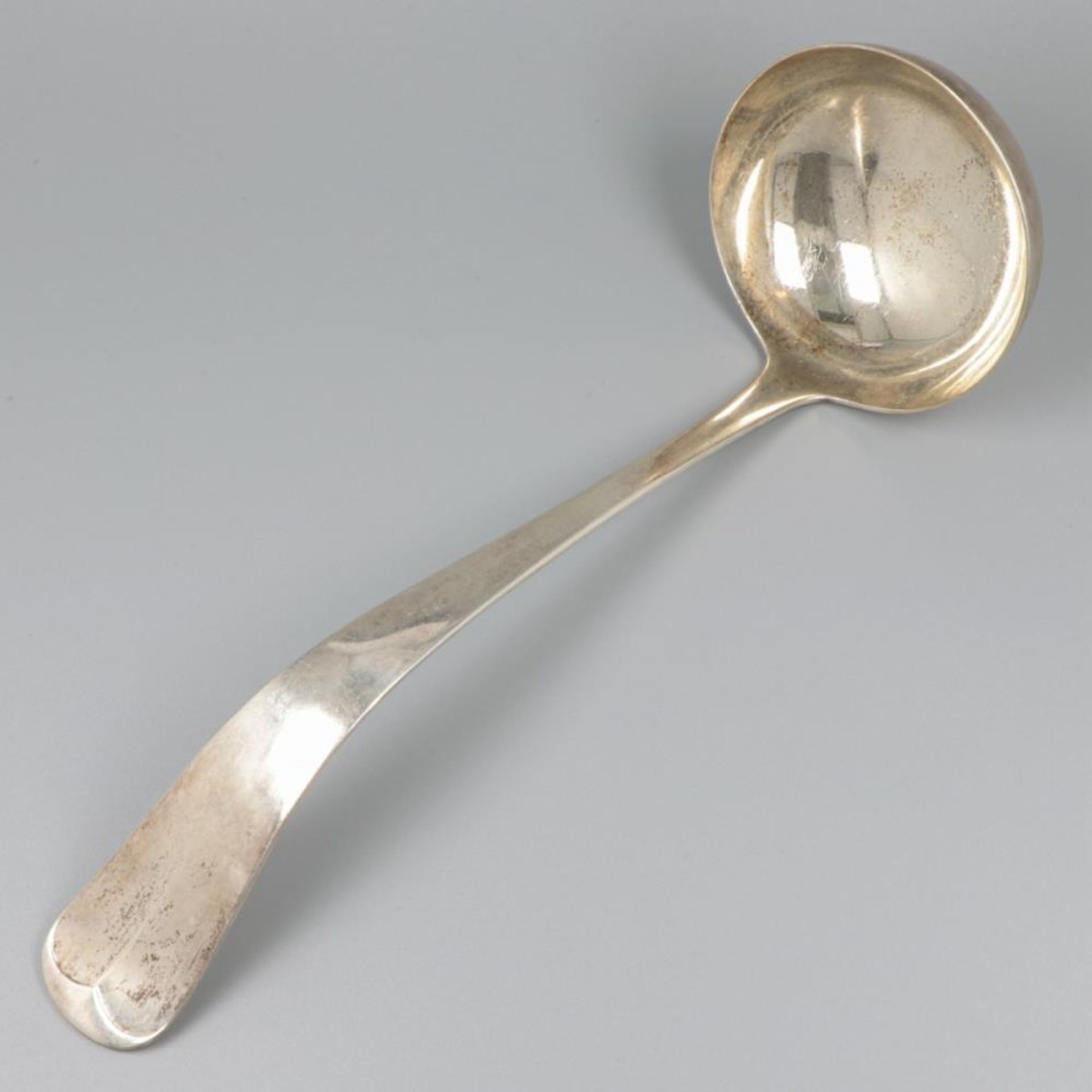 Soup ladle silver.