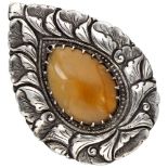 Antique 800 silver floral decorated pear-shaped scarf clip set with amber.