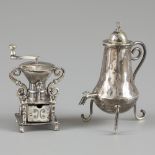 2-piece lot of silver miniatures.