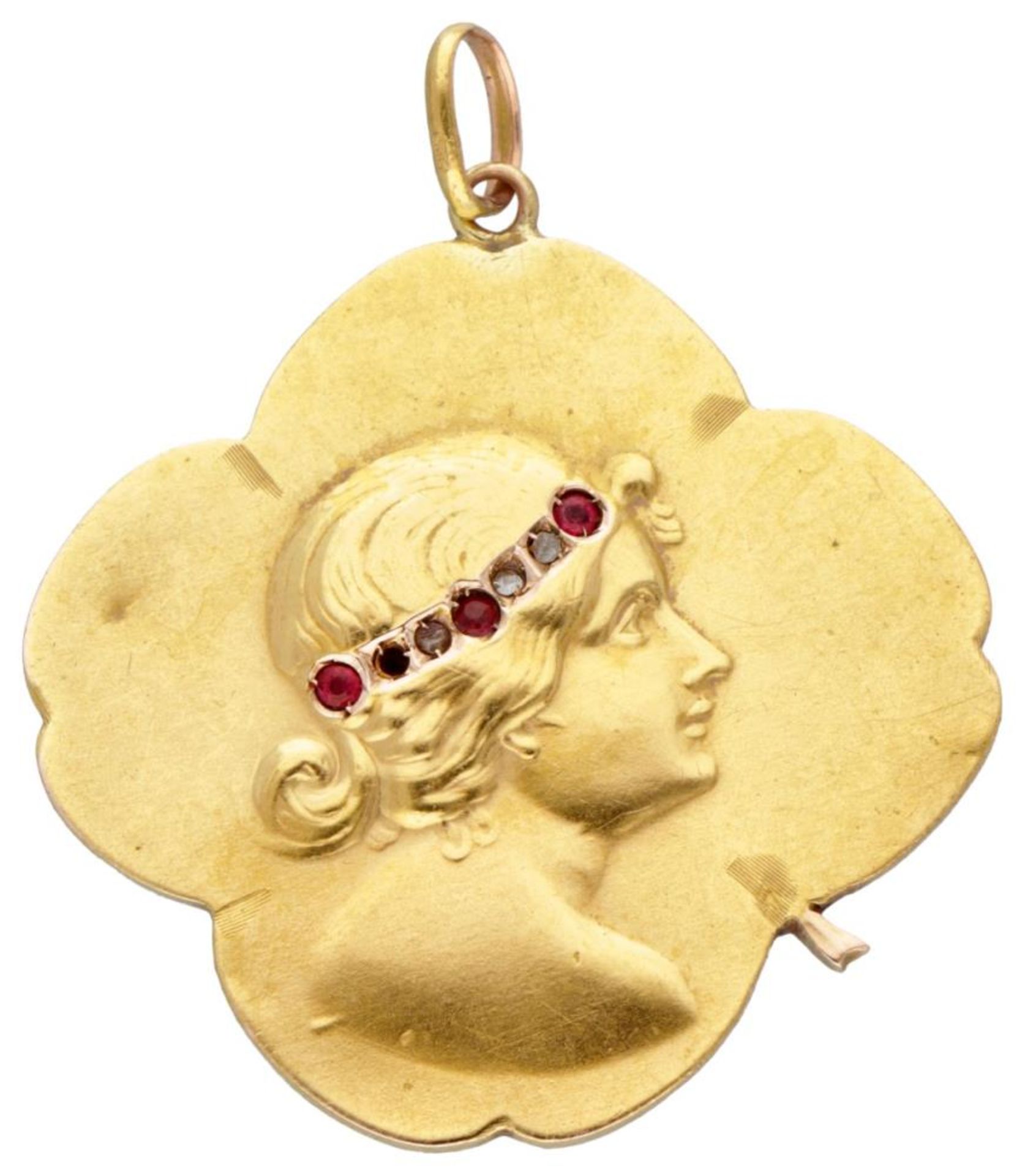 20K. Yellow gold Art Nouveau repousse pendant set with diamond and glass garnet.