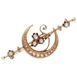 BLA 10K. rose gold antique crescent brooch set with seed pearls.