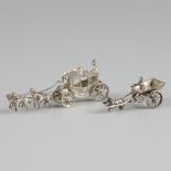 2-piece lot of miniature carriages, silver.