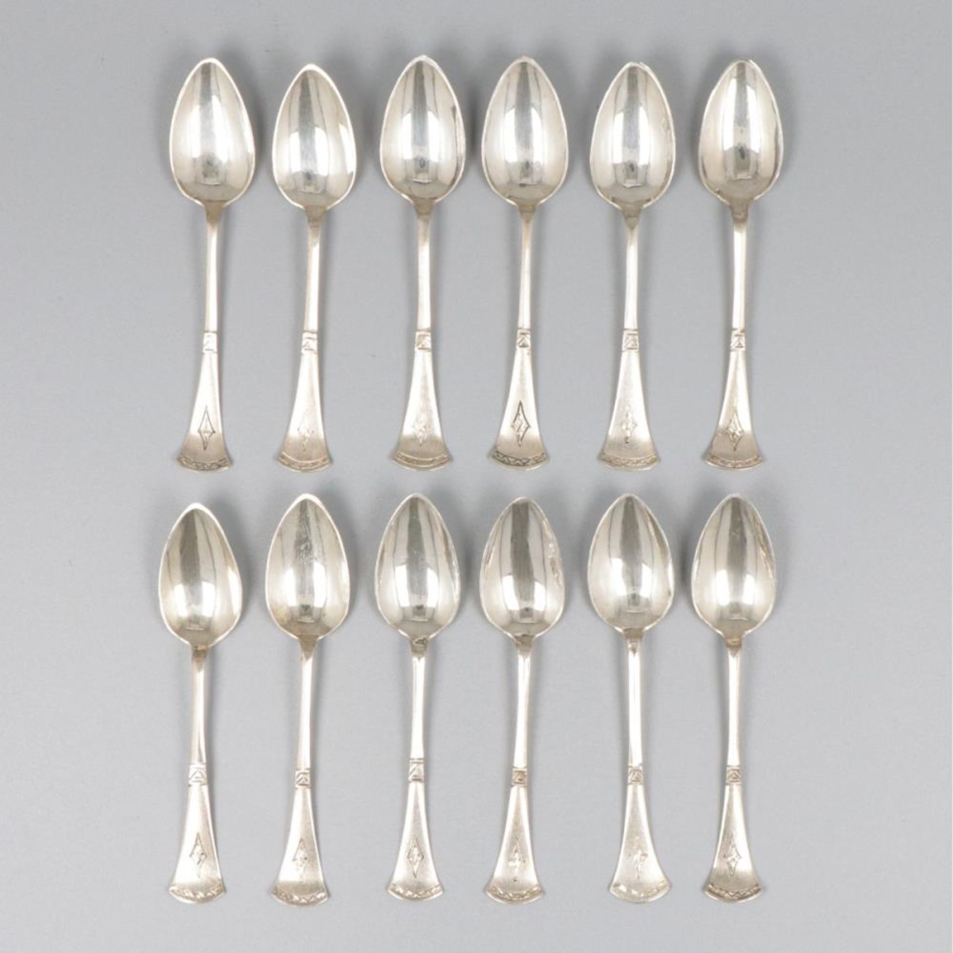 12-piece set silver coffee spoons.