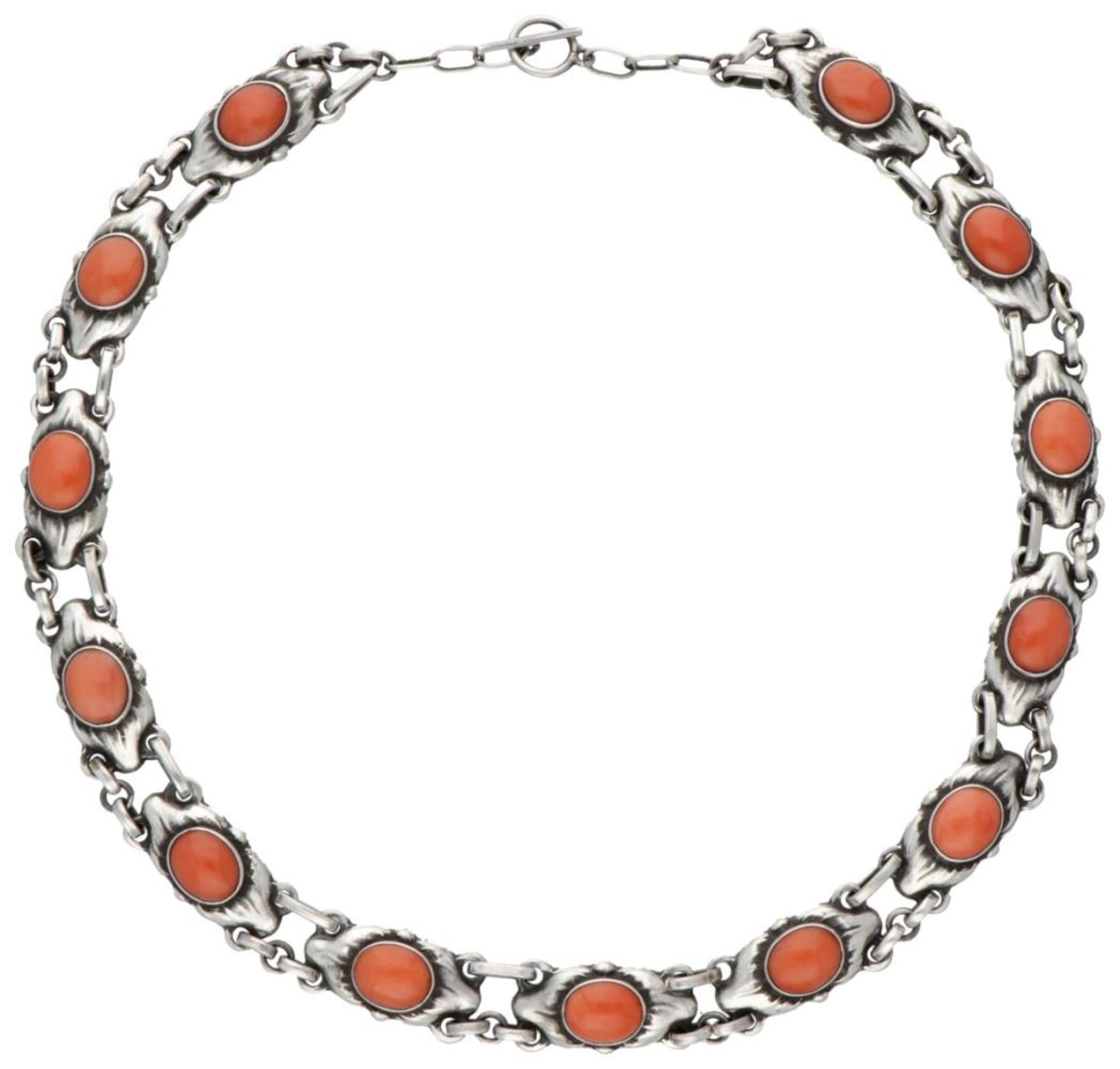 Sterling silver Art Nouveau style necklace no.22 by Georg Jensen, set with red coral.