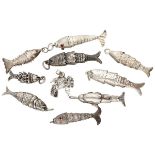 Lot of 10 silver flexible fish pendants.