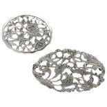 Lot of two sterling silver vintage brooches with floral details.