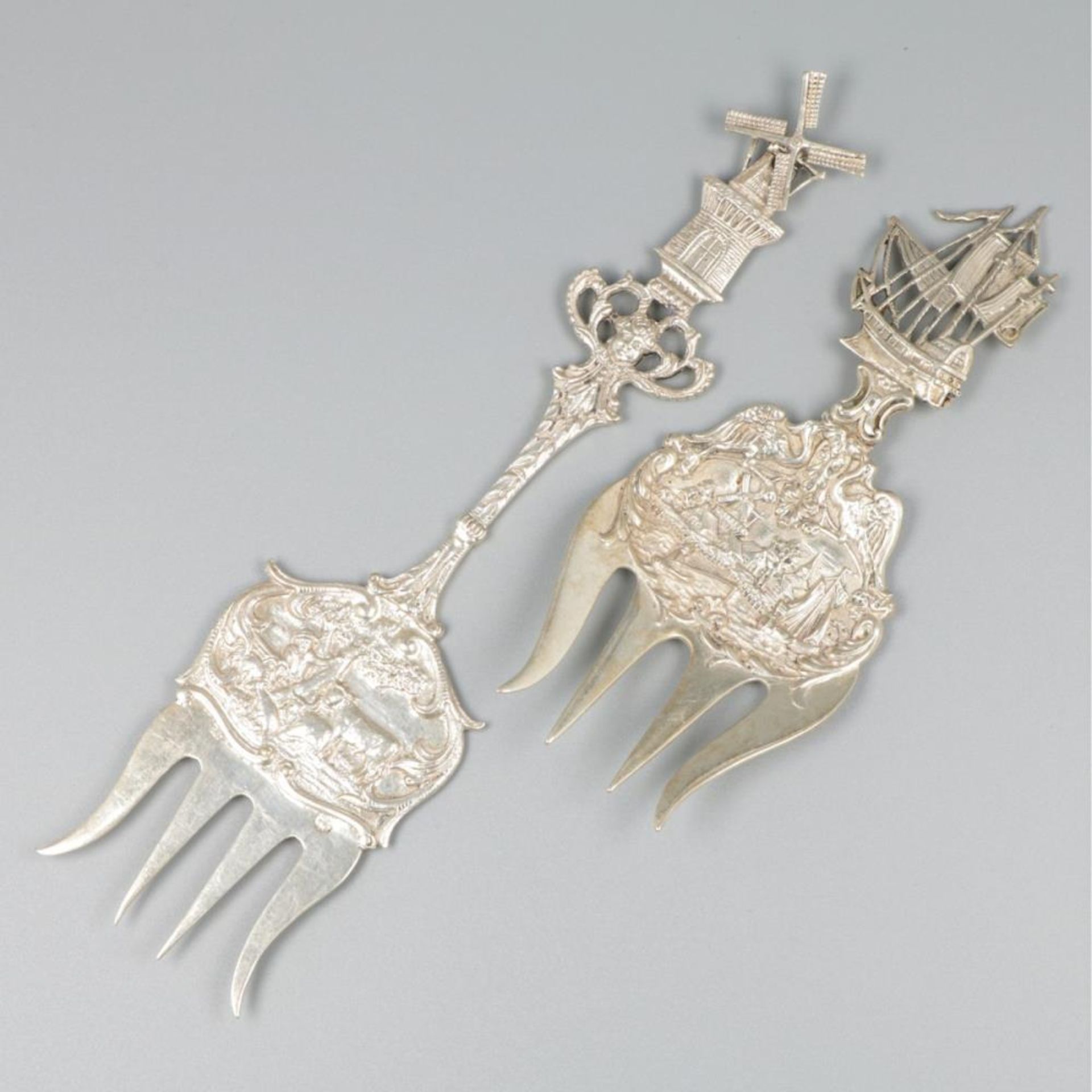 2-piece lot silver bread forks.