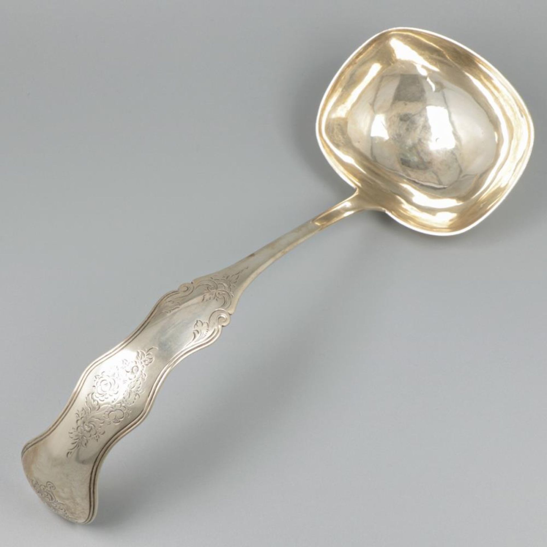 Soup ladle silver.