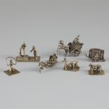 7-piece lot of silver miniatures.
