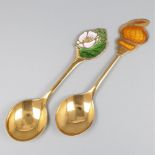 2-piece lot of year spoons (Germany Robbe & Berking 1983 & 1986) silver.