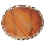 BLA 10K. yellow gold vintage brooch set with an orange agate.