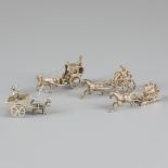 4-piece lot of miniature carriages, silver.