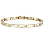 14K. Yellow gold link bracelet with meander motif.