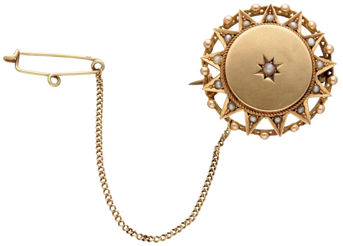 Victorian 14K. yellow gold star-shaped brooch set with seed pearls.