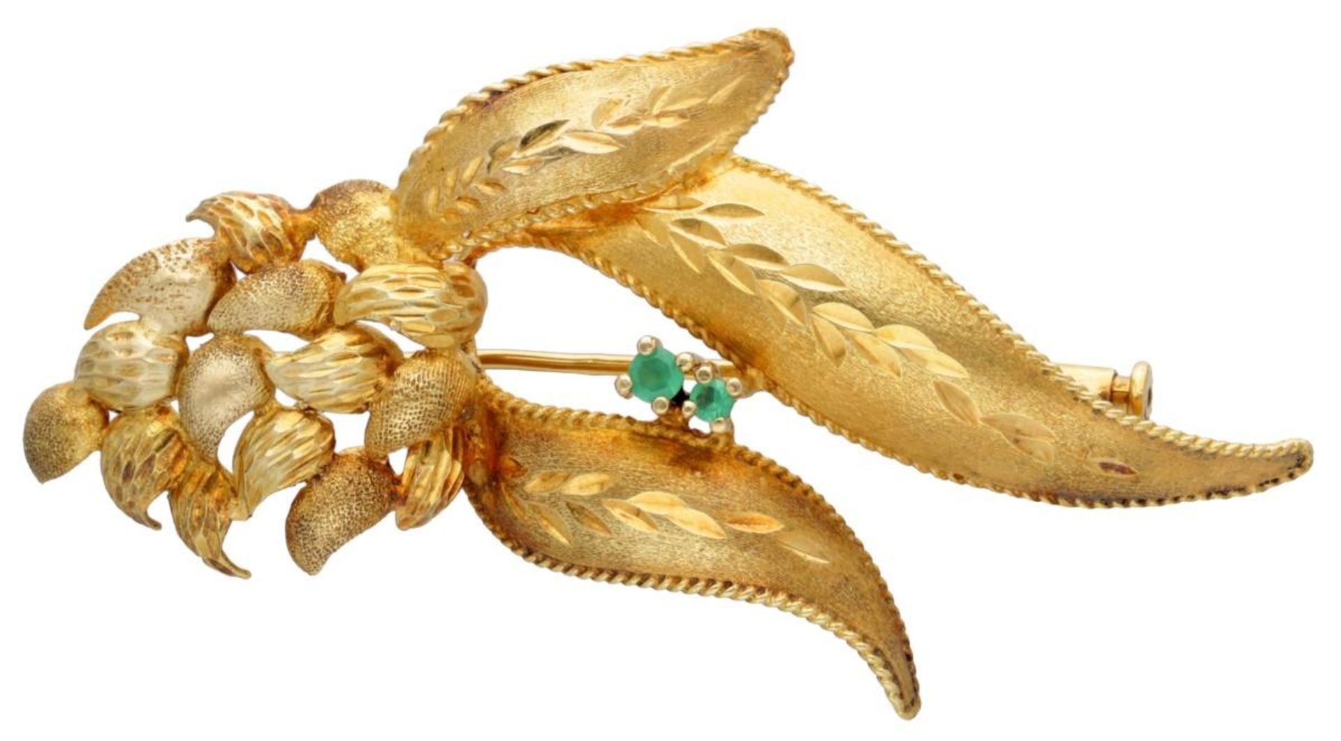 Vintage 14K. yellow gold brooch set with approx. 0.06 ct. emeralds.
