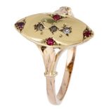 18K. Bicolor gold navette ring set with rhinestones.