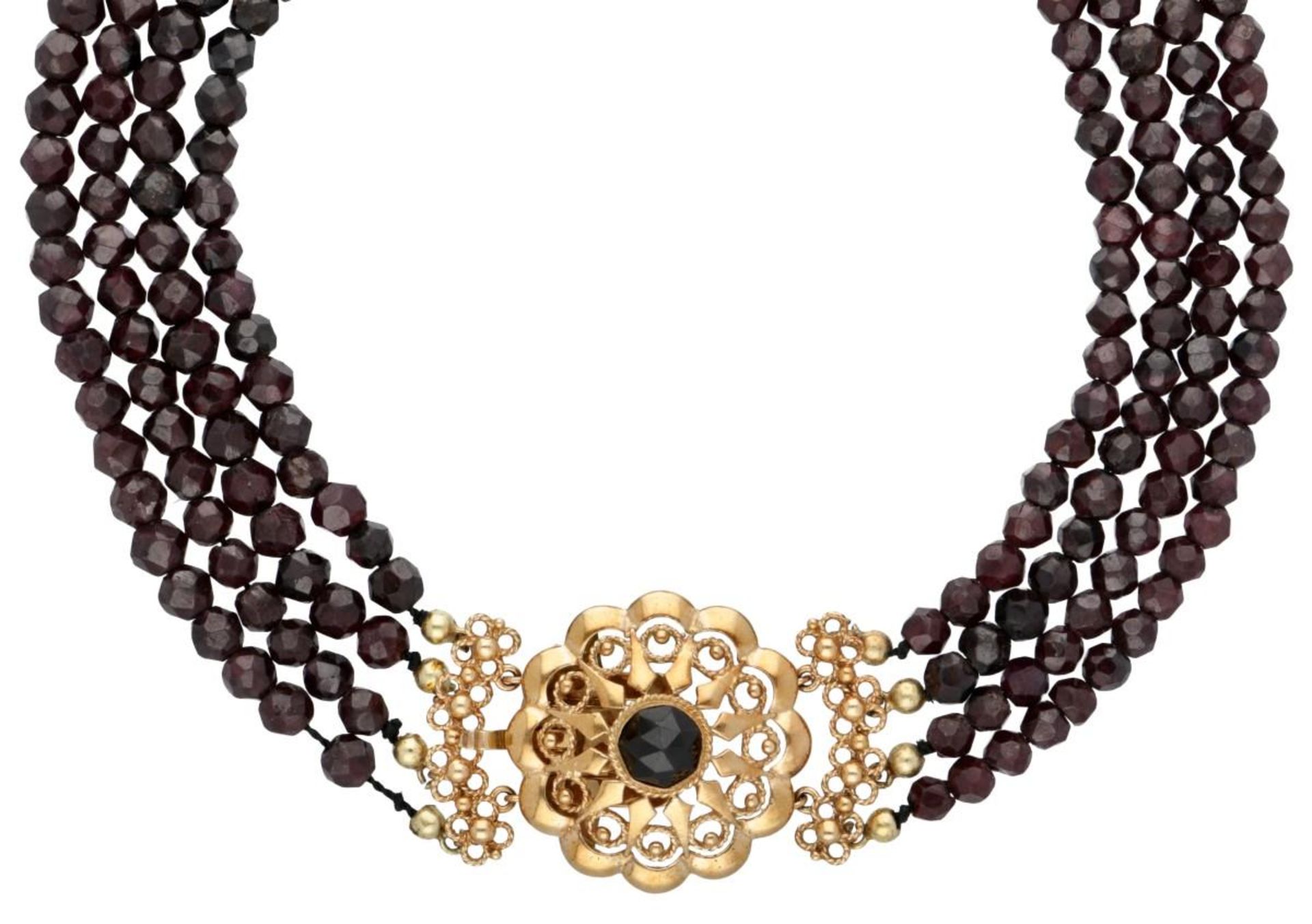 Three-row garnet necklace with a 14K. yellow gold closure.