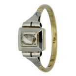 18K. Bicolor gold Art Deco ring set with a diamond.