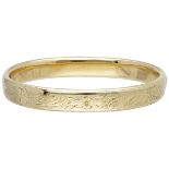 14K. Yellow gold floral engraved bangle bracelet.