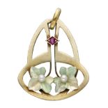 14K. Yellow gold Art Nouveau pendant set with pearl and ruby.
