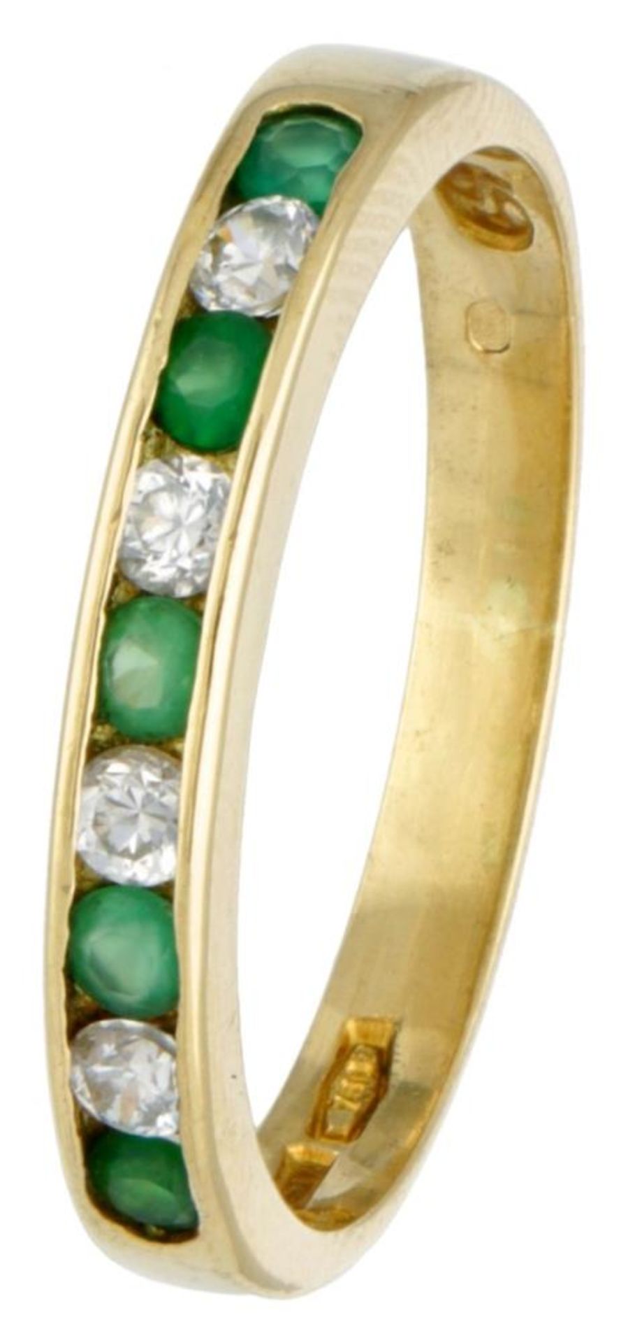18K. Yellow gold ring set with approx. 0.18 ct. emerald and rhinestones.