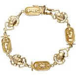 14K. Yellow gold Revival bracelet with hieroglyphs and scarabs.