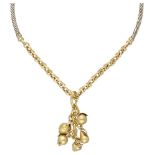 18K. Bicolor gold Pomellato necklace and pendant including 5 charms of various fruits.