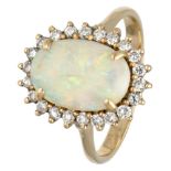 Vintage BLA 10K. yellow gold entourage ring set with approx. 1.95 ct. precious opal and approx. 0.22