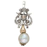 14K. Gold / sterling silver pendant set with diamonds and a pearl.