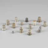 14-piece lot of silver thimbles.