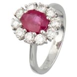 18K. White gold entourage ring set with approx. 0.90 ct. diamond and approx. 1.41 ct. ruby.