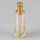 Perfume bottle gold.