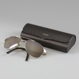 Cartier Santos Dumont Aviator sunglasses.