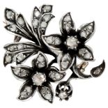 Antique sterling silver / 14K. rose gold floral brooch set with rose cut diamonds.