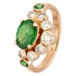 Vintage 18K. yellow gold ring set with approx. 0.33 ct. diamond and green gemstone.