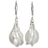 18K. White gold earrings set with white baroque pearls and approx. 0.55 ct. diamond.