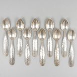10-piece set of silver teaspoons.