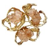 BLA 10K. yellow gold Anneke Schat design brooch set with spessartine garnet crystals.