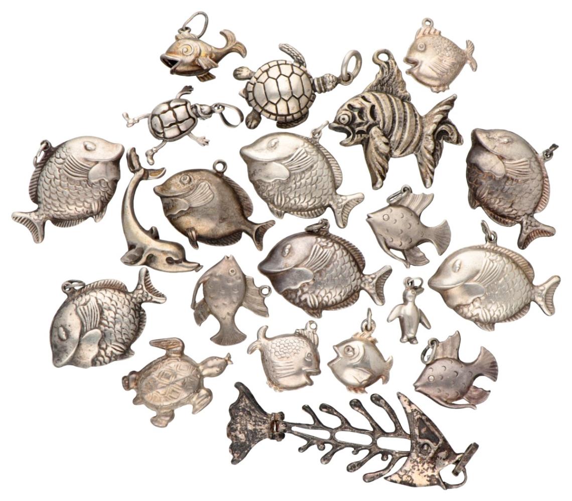 Lot of various silver pendants of sea animals.