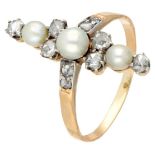18K. Yellow gold ring set with rose cut diamond and pearl.