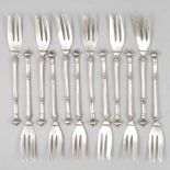 12-piece set of silver cake / pastry forks.