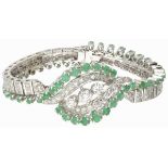 18K. White gold bracelet set with approx. 2.10 ct. diamond and approx. 4.54 ct. natural emerald.